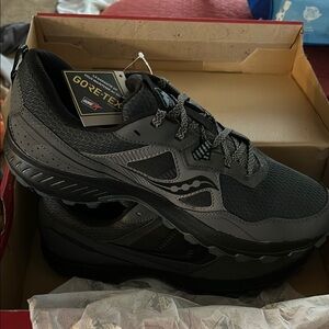 Saucony Black Athletic Shoes with Breathable Mesh Upper and Thick Cushioned Sole